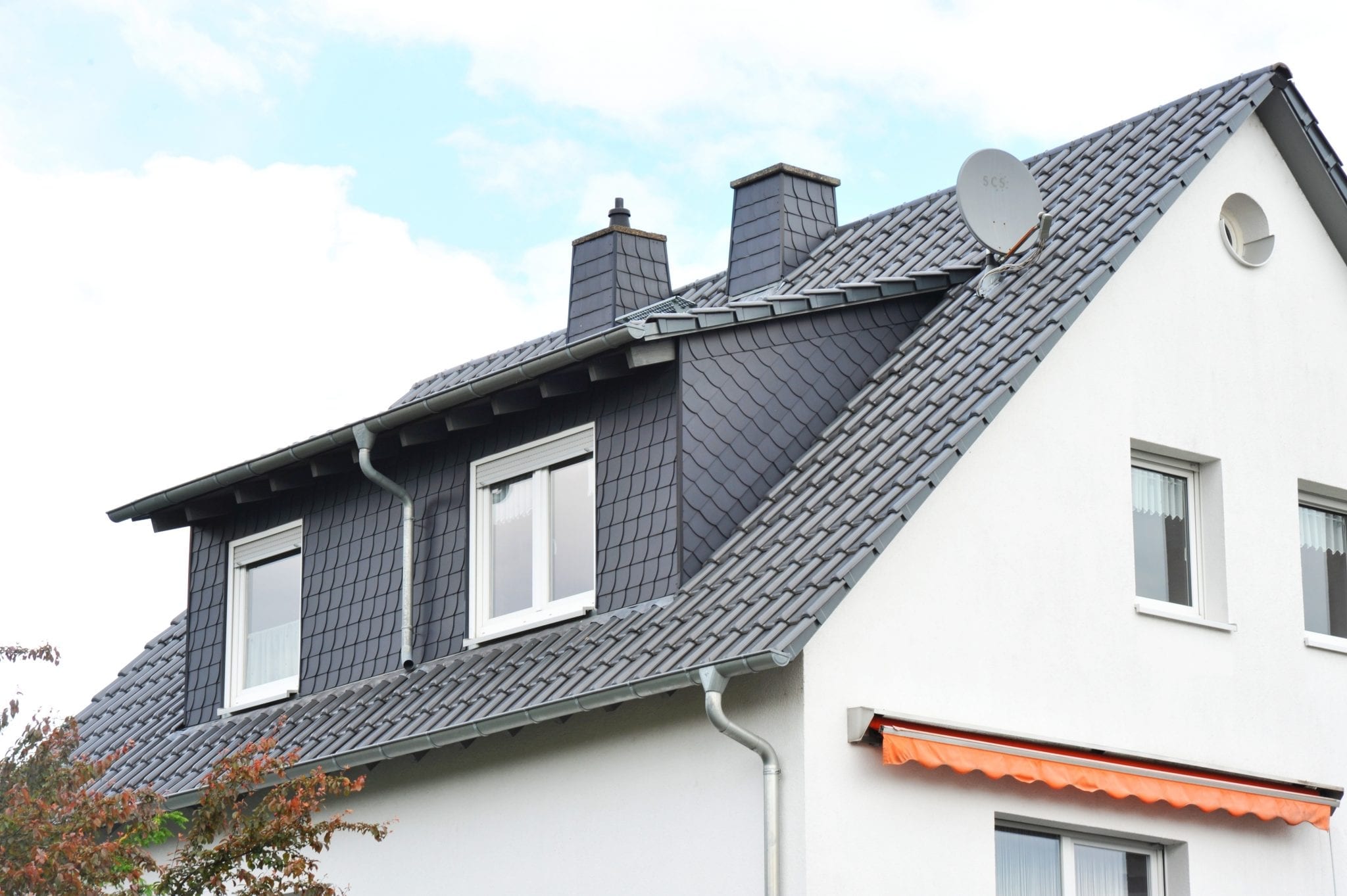 Calgary Roofing Companies | Claw Roofing | Dormers Added To Home