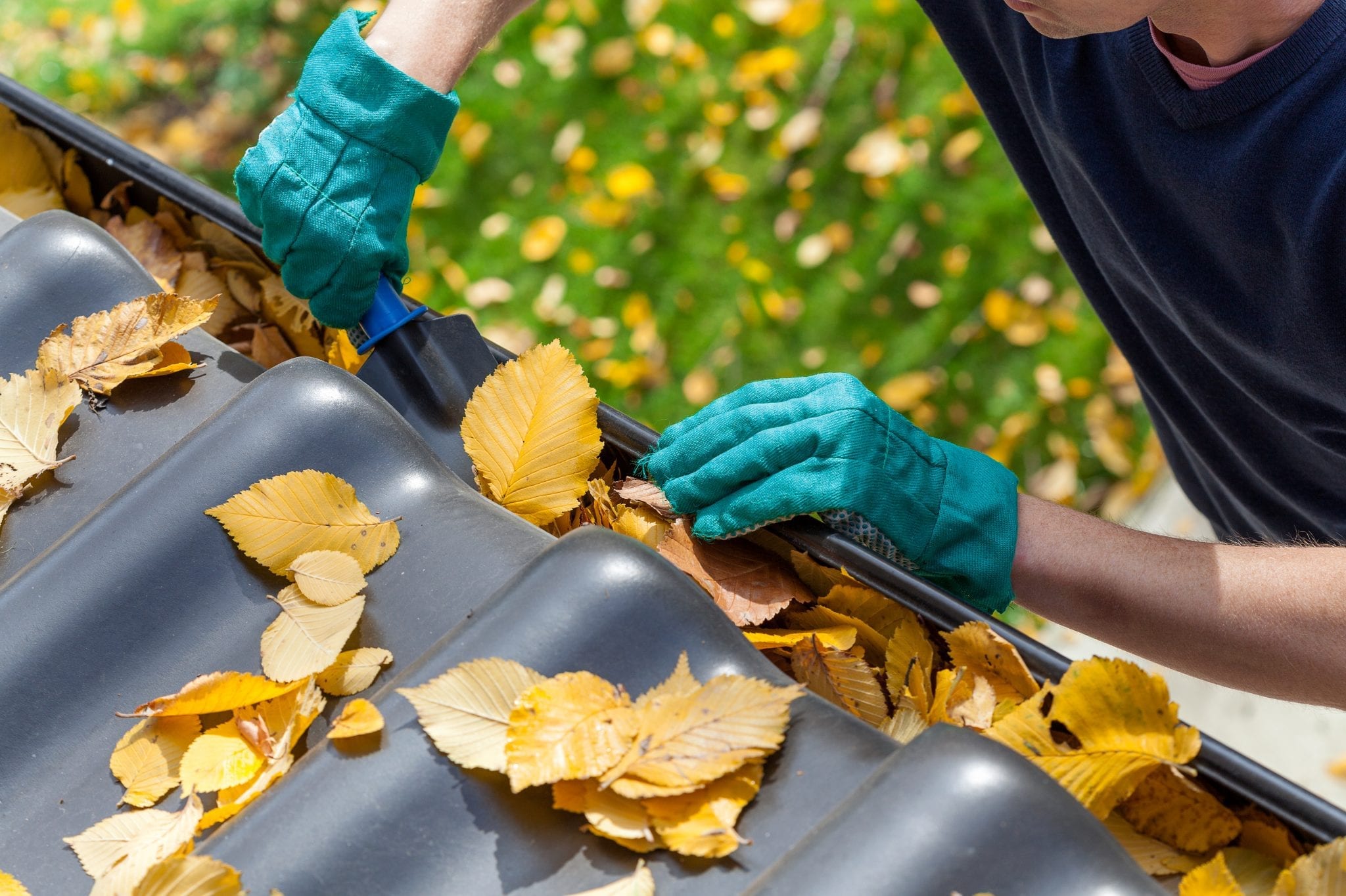 cleaning gutters claw calgary roofing company